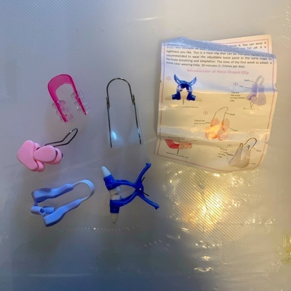 Nose shaper clamps